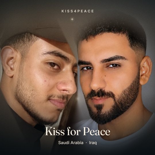 A kiss for peace between two strangers from Saudi Arabia and Iraq